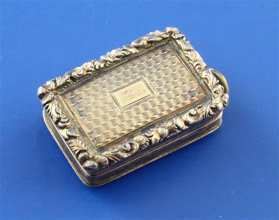 A William IV engine turned silver gilt rectangular vinaigrette by Nathaniel Mills, 1in.